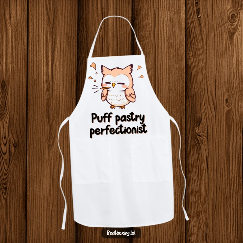 Funny Owl Apron: A small owl character blowing air out energetically for a 'p' sound, a humorous kitchen accessory.
