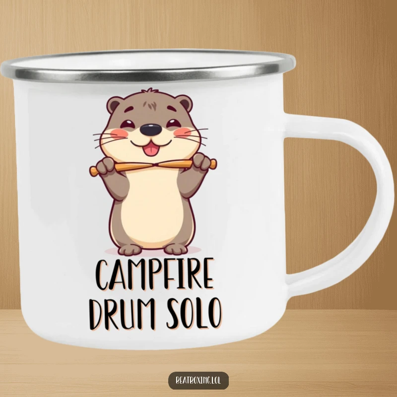 Funny camping mug with a cheerful otter balancing drumsticks on its nose, perfect for outdoor rhythm lovers.