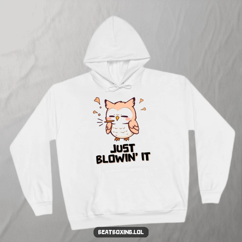 Funny Owl Hoodie: A small owl character blowing air out forcefully for a 'p' sound, conveying playful energy and warmth.