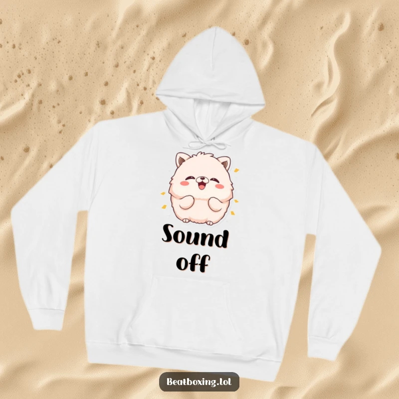 Funny hoodie, cozy and warm, with a fluffy animal character loudly exclaiming 'boom' with puffed cheeks, radiating playful energy.