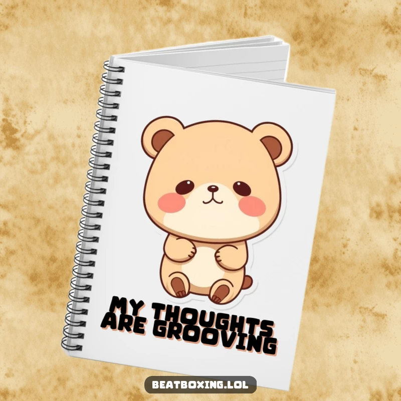 Funny notebook with a cute bear character bobbing its head to music, cheeks puffed, ideal for jotting down notes and ideas.
